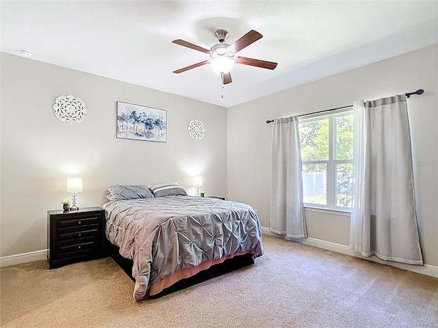 5235 SE 91st St, Ocala, FL 34480 - bedroom featuring ceiling fan, baseboards, and light carpet