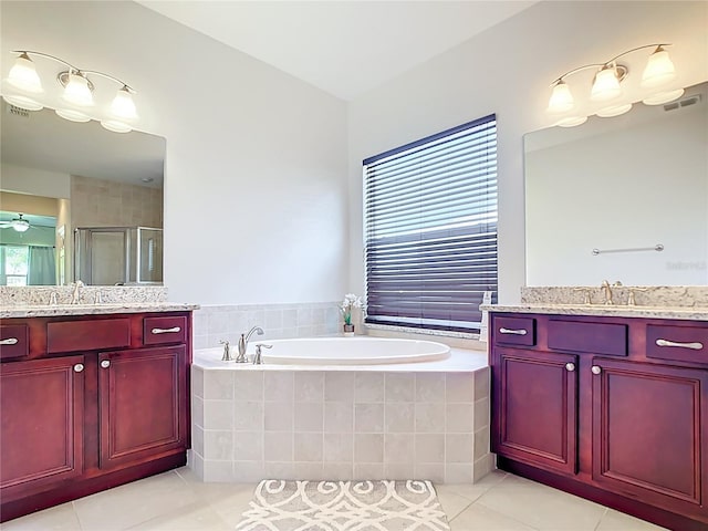 5235 SE 91st St, Ocala, FL 34480 - full bathroom with visible vents, a stall shower, two vanities, and a sink