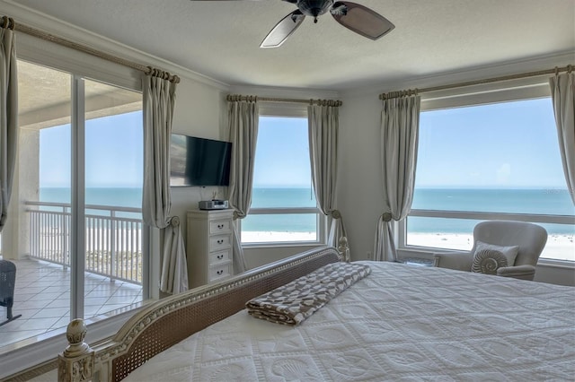 bedroom featuring crown molding, access to exterior, ceiling fan, and a textured ceiling