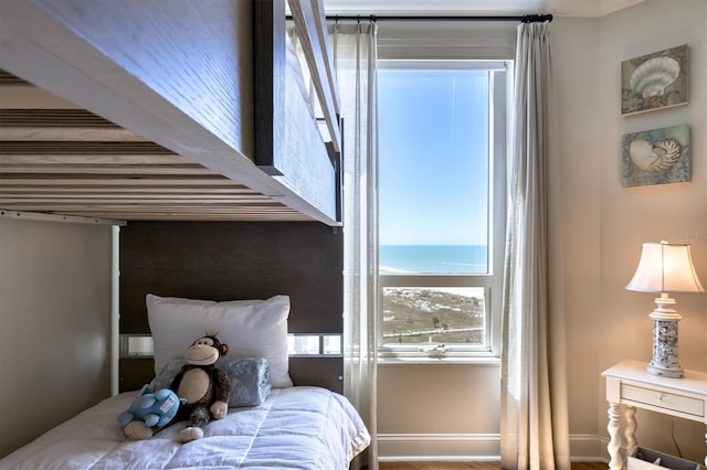 bedroom featuring baseboards