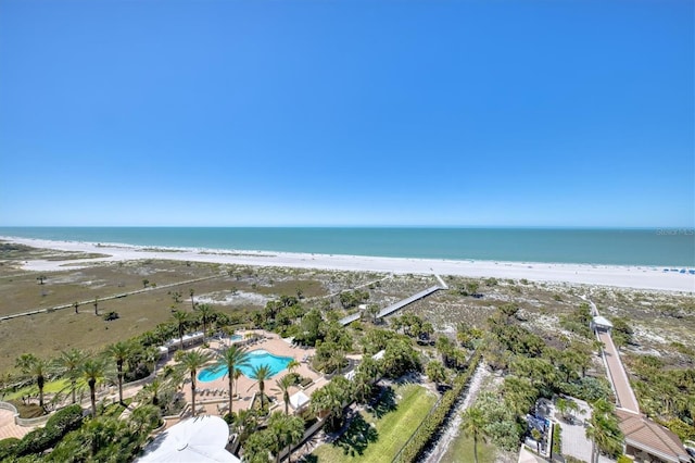 aerial view featuring a water view and a beach view