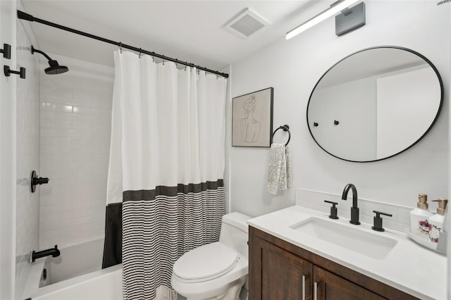 6277 Bahia Del Mar Blvd Unit 210, Saint Petersburg, FL 33715 - full bathroom featuring toilet, shower / bathtub combination with curtain, and vanity