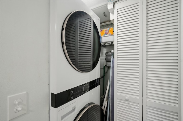 6277 Bahia Del Mar Blvd Unit 210, Saint Petersburg, FL 33715 - laundry area featuring stacked washer / drying machine