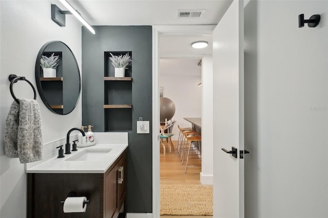 6277 Bahia Del Mar Blvd Unit 210, Saint Petersburg, FL 33715 - bathroom featuring vanity and wood finished floors