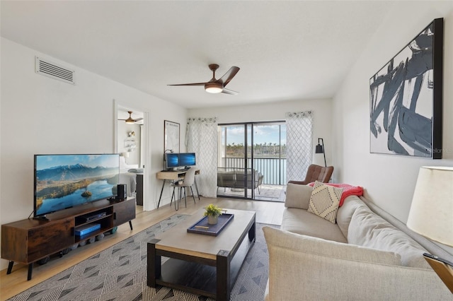 6277 Bahia Del Mar Blvd Unit 210, Saint Petersburg, FL 33715 - living room featuring a ceiling fan and wood finished floors
