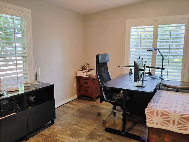 11233 51st Ave N, Saint Petersburg, FL 33708 - office area with baseboards and wood finished floors