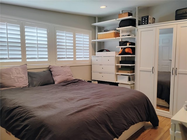 11233 51st Ave N, Saint Petersburg, FL 33708 - bedroom with light wood finished floors and recessed lighting