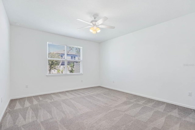 14180 Samoa Hill Ct, Riverview, FL 33569 - spare room featuring carpet flooring, baseboards, and ceiling fan