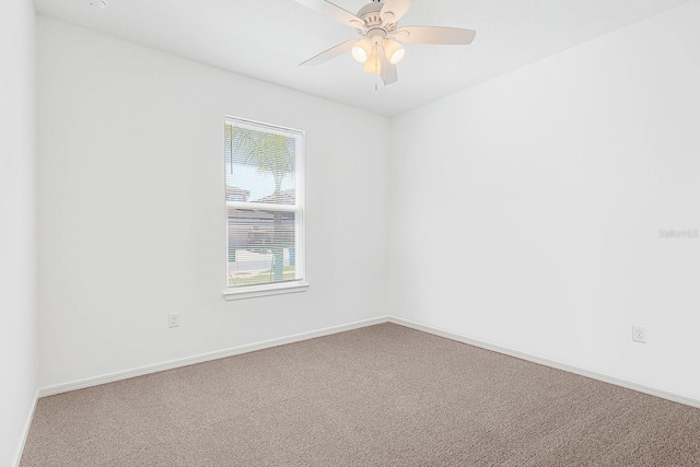 14180 Samoa Hill Ct, Riverview, FL 33569 - spare room with carpet floors, baseboards, and a ceiling fan