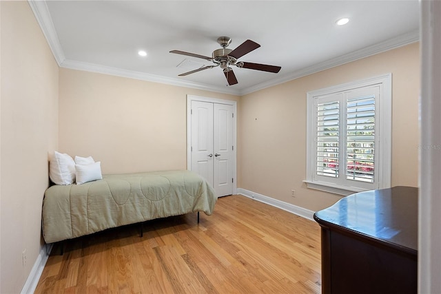 bedroom featuring recessed lighting, baseboards, crown molding, and light wood-style floors