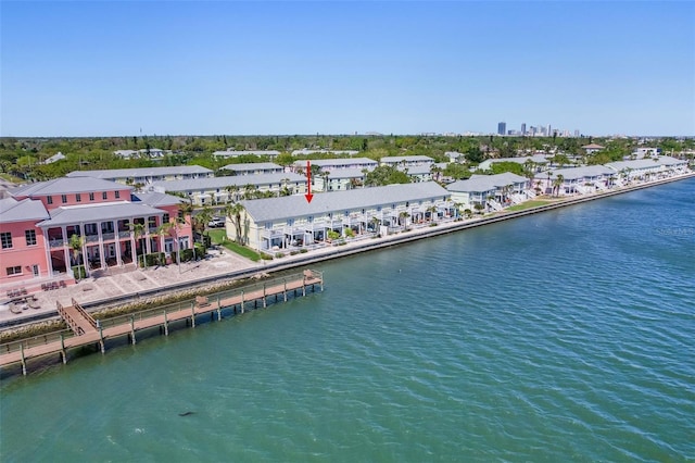 bird's eye view with a residential view and a water view