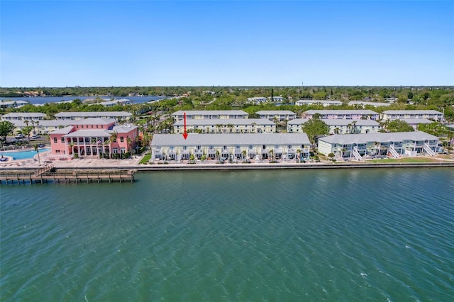 birds eye view of property featuring a residential view and a water view