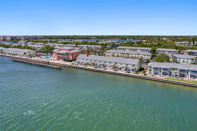 birds eye view of property featuring a residential view and a water view