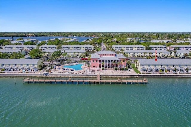 aerial view with a residential view and a water view