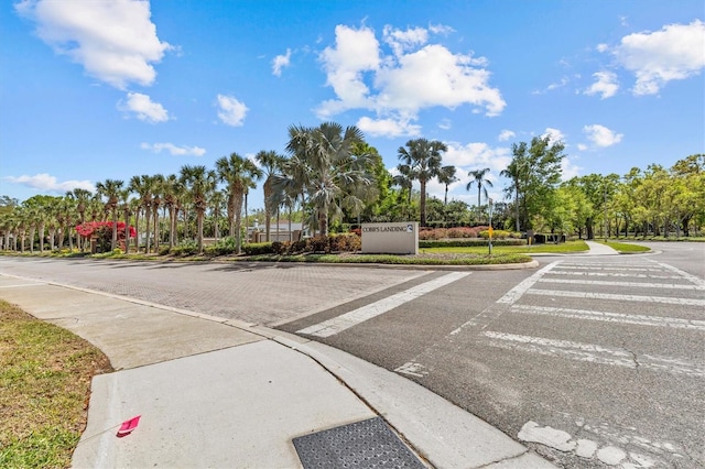 view of street featuring curbs and sidewalks