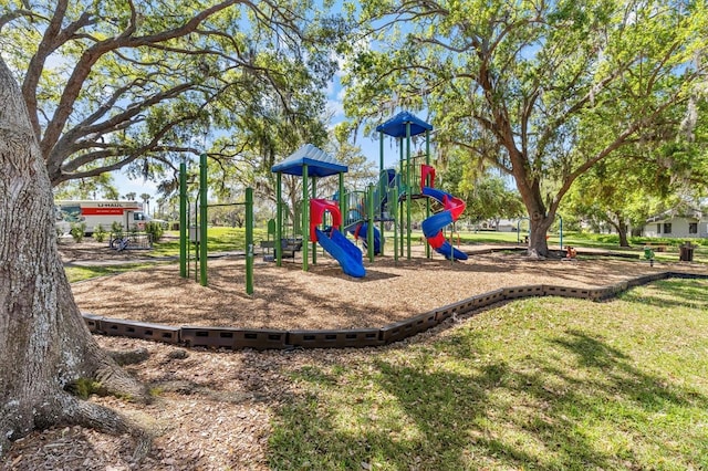 community playground featuring a yard