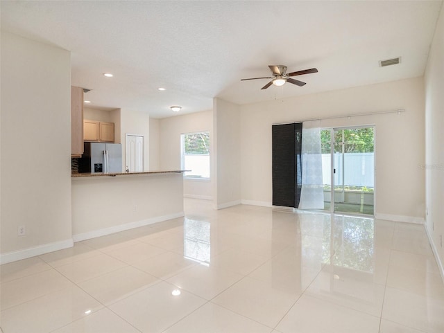 405 Laguna Mill Dr, Ruskin, FL 33570 - spare room featuring a ceiling fan, light tile patterned floors, and recessed lighting