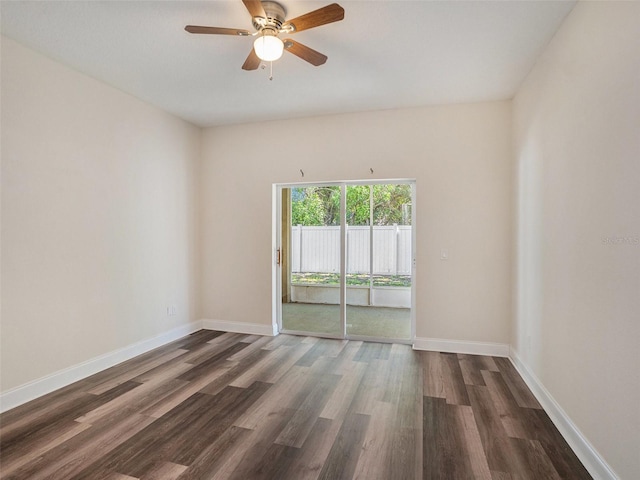 405 Laguna Mill Dr, Ruskin, FL 33570 - empty room featuring dark wood-type flooring and a ceiling fan