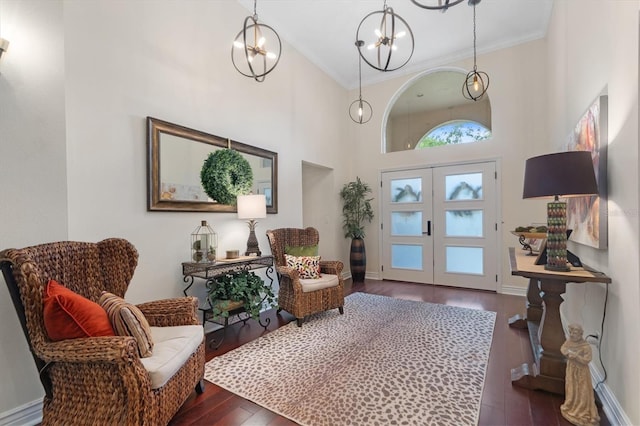 17503 Edinburgh Dr, Tampa, FL 33647 - foyer with dark wood finished floors, crown molding, and baseboards