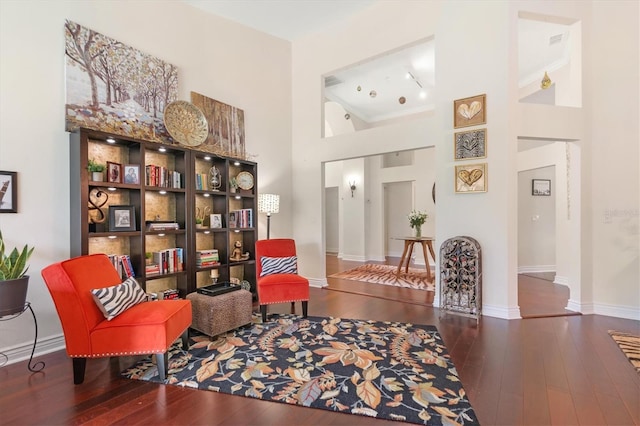 17503 Edinburgh Dr, Tampa, FL 33647 - living area with baseboards, wood-type flooring, and a high ceiling
