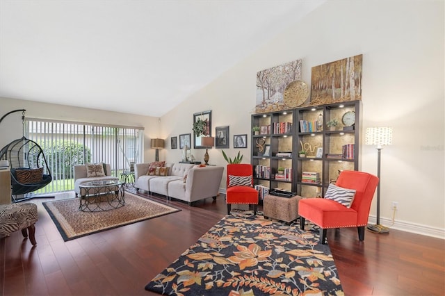 17503 Edinburgh Dr, Tampa, FL 33647 - living room featuring baseboards, high vaulted ceiling, and wood finished floors
