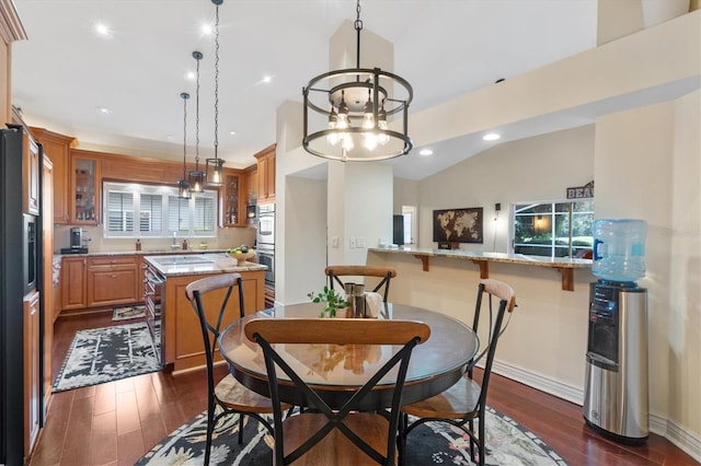 17503 Edinburgh Dr, Tampa, FL 33647 - dining space with recessed lighting, baseboards, an inviting chandelier, and dark wood finished floors