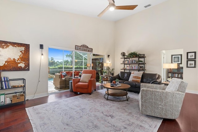 17503 Edinburgh Dr, Tampa, FL 33647 - living room featuring visible vents, a ceiling fan, wood finished floors, a high ceiling, and baseboards
