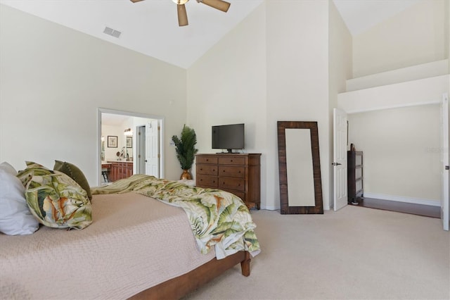 17503 Edinburgh Dr, Tampa, FL 33647 - carpeted bedroom with visible vents, high vaulted ceiling, a ceiling fan, connected bathroom, and baseboards
