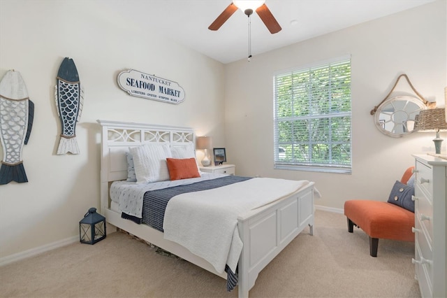 17503 Edinburgh Dr, Tampa, FL 33647 - bedroom featuring light colored carpet, baseboards, and ceiling fan