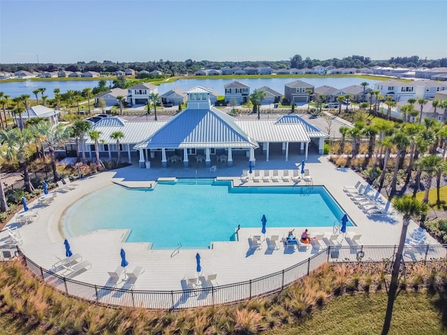 view of swimming pool with a gazebo, a residential view, and fence