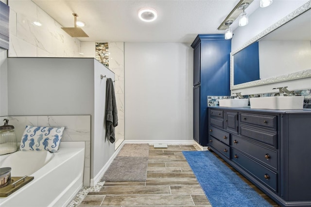 bathroom with vanity, a garden tub, walk in shower, and wood tiled floor