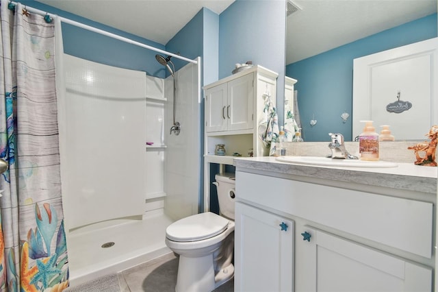 full bathroom featuring visible vents, toilet, curtained shower, tile patterned flooring, and vanity