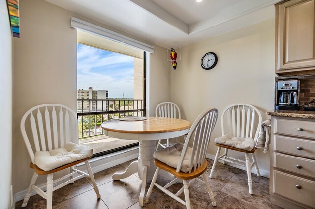 dining room featuring baseboards