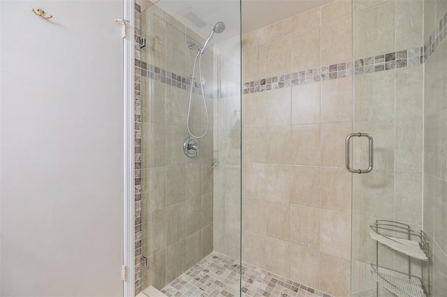 bathroom with a shower stall