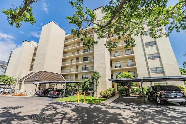 view of property with covered parking