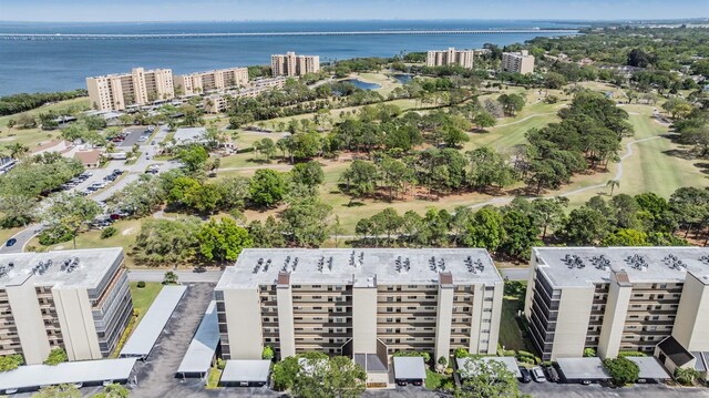 drone / aerial view with a water view and a view of city