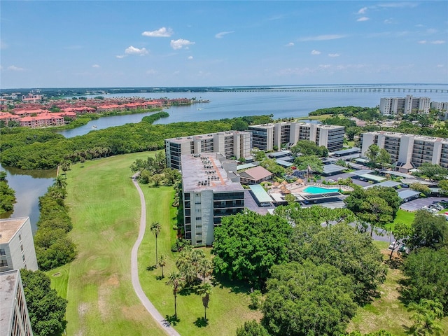 aerial view featuring a city view and a water view