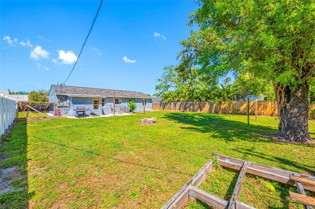 3310 W Swann Ave, Tampa, FL 33609 - view of yard with a patio and a fenced backyard