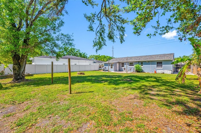 3310 W Swann Ave, Tampa, FL 33609 - view of yard featuring a fenced backyard