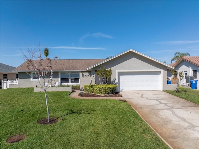 single story home featuring central AC unit, driveway, an attached garage, stucco siding, and a front lawn
