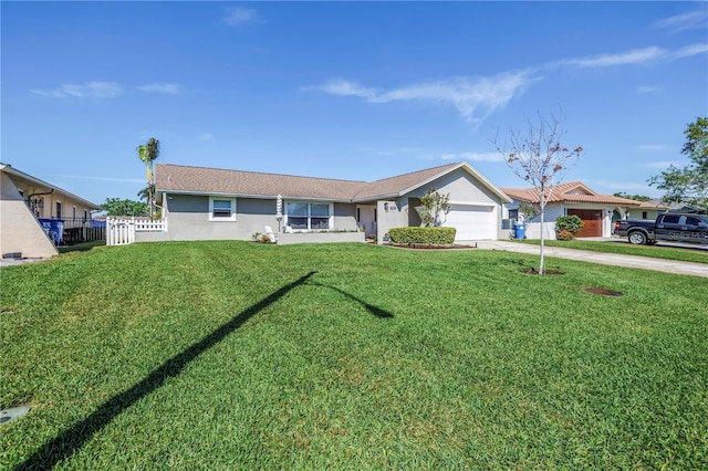 ranch-style house with fence, a front yard, stucco siding, driveway, and an attached garage