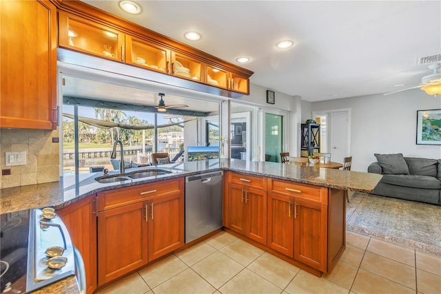 kitchen with a sink, visible vents, stainless steel dishwasher, and ceiling fan