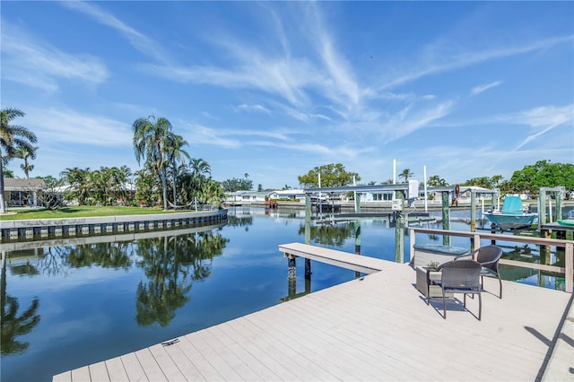 view of dock featuring a water view and boat lift