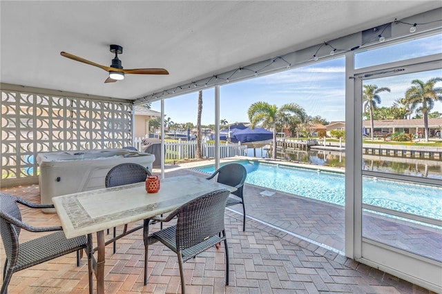 view of pool featuring a patio area, a fenced in pool, a ceiling fan, and fence