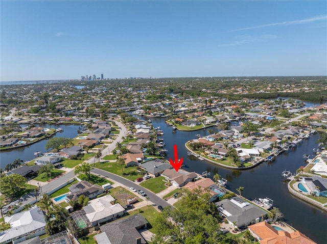 birds eye view of property featuring a residential view and a water view