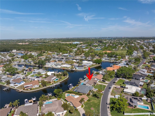 bird's eye view with a residential view and a water view