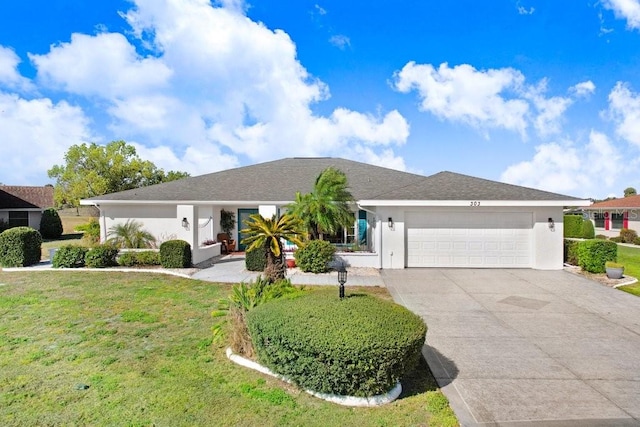 ranch-style home with stucco siding, a front lawn, concrete driveway, and a garage