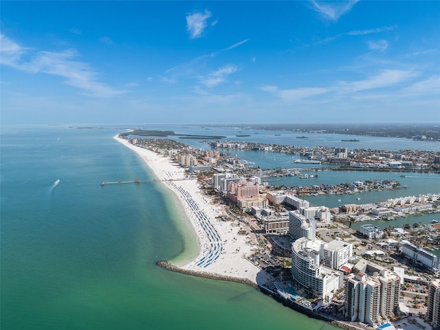 aerial view featuring a city view, a beach view, and a water view