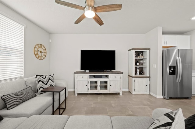 2760 Scarlet Bay Pl, Brandon, FL 33510 - living room featuring baseboards, light tile patterned flooring, and a ceiling fan