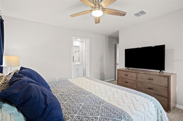 2760 Scarlet Bay Pl, Brandon, FL 33510 - bedroom with visible vents, connected bathroom, ceiling fan, baseboards, and light carpet